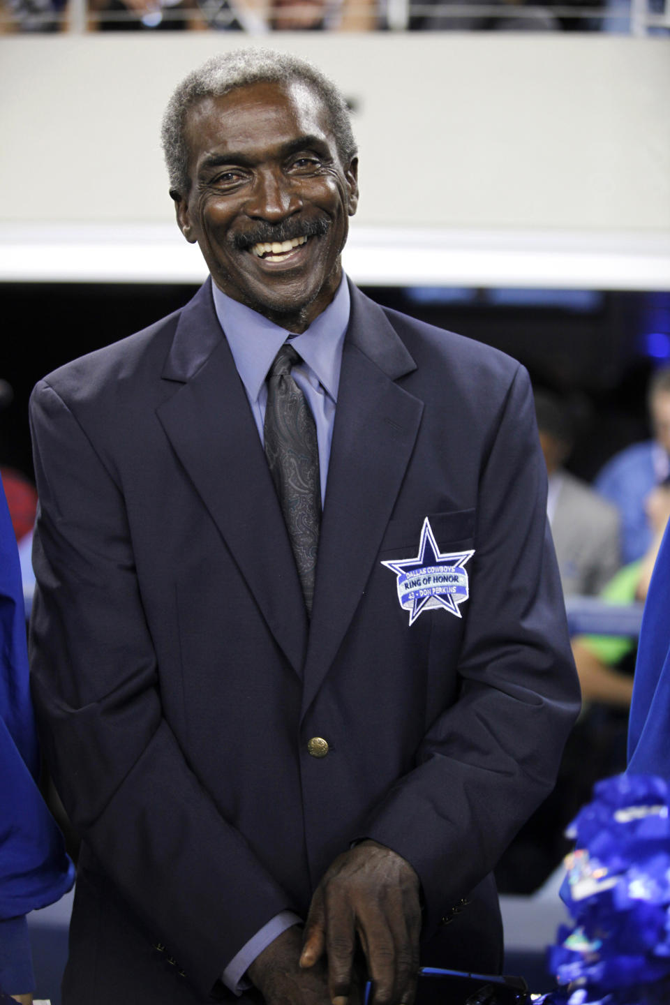 FILE - Former Dallas Cowboy Don Perkins smiles before a halftime ceremony during the team's NFL football game against the New York Giants on Sept. 20, 2009, in Arlington, Texas. Perkins, a six-time Pro Bowl running back with the Cowboys in the 1960s, has died. He was 84. The NFL team and the University of New Mexico, where Perkins was a standout player before his professional career, said Perkins died Thursday, June 9, 2022. No cause of death was revealed. (AP Photo/Sharon Ellman, File)