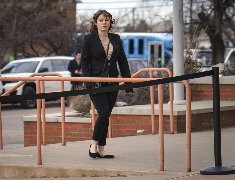 Hannah Gutierrez-Reed arrives at the First Judicial District Courthouse in Santa Fe, N.M., on Wednesday, Feb. 21, 2024, for the start of her trial on charges of involuntary manslaughter and tampering with evidence. Prosecutors in New Mexico are pursuing accountability for the 2021 death of a cinematographer who was fatally shot by actor Alec Baldwin during a rehearsal for the Western film “Rust.” (Gabriela Campos/Santa Fe New Mexican via AP, Pool)