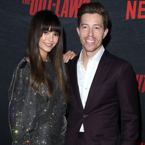 <p>Steve Granitz/FilmMagic</p> Nina Dobrev and Shaun White at the L.A. premiere of 'The Out-Laws' in June 2023.