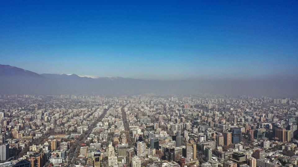 Aerial view of the city of Santiago showing the smog caused by high temperatures in August. (Getty)