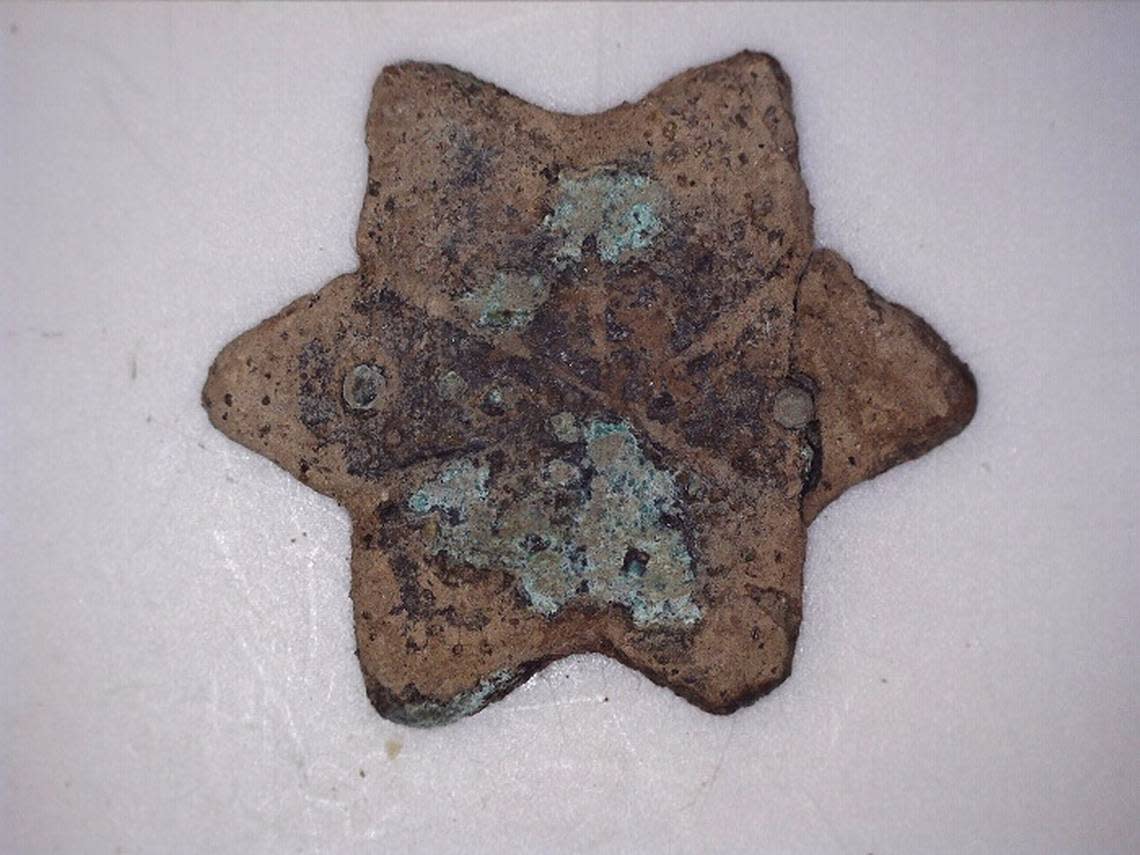 Part of a copper belt found at the site. Photo from Radosław Zdaniewicz via Science in Poland