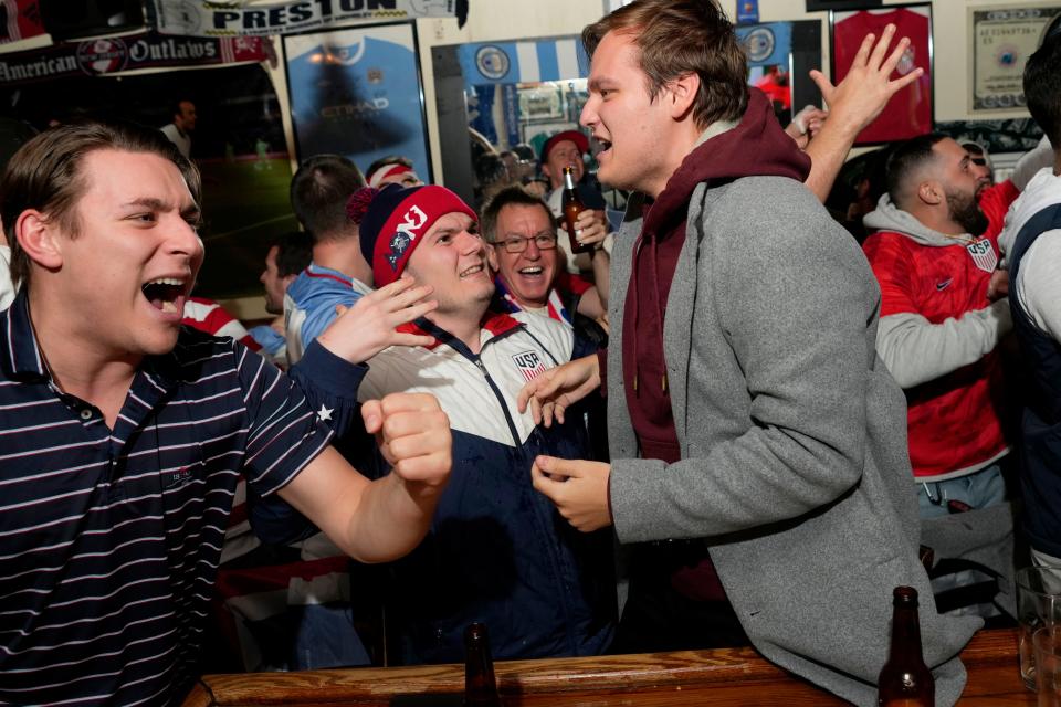 Fans at Mulligan's Pub, in Hoboken, react as USA scores the first goal in their World Cup game against Wales.  Monday, November 21, 2022