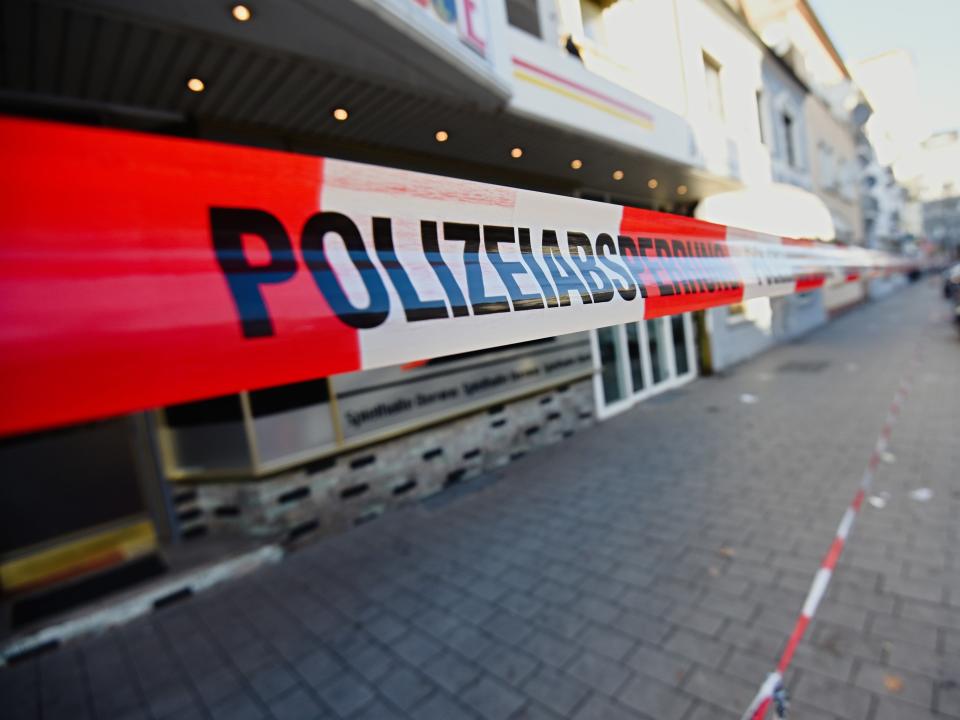 A police cordon is hanging near a crime scene in Hanau, Germany, where a 43 year old German gunman killed nine immigrants on Wednesday, February 19.