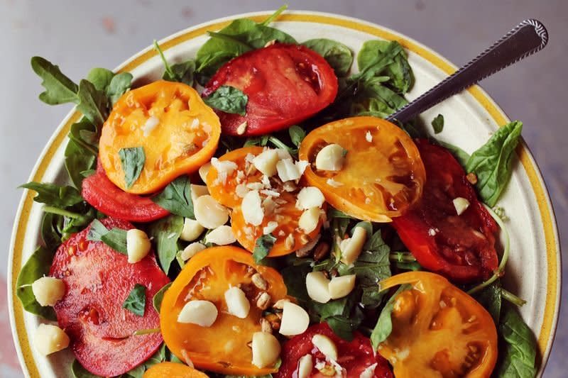 <strong>Get the <a href="http://www.abeautifulmess.com/2012/07/5-favorite-summer-salads.html" target="_blank">Tomato + Basil Salad recipe</a> from A Beautiful Mess</strong>