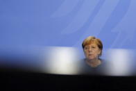 German Chancellor Angela Merkel (CDU), during a press conference at the Chancellery in Berlin, Wednesday, Oct. 28, 2020. Merkel is pressing for a partial lockdown as the number of newly recorded infections in the country hit another record high Wednesday. (Fabrizio Bensch/pool photo via AP)