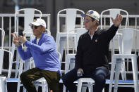 Golden State Warriors owners Peter Guber, left, and Joe Lacob appear on stage before the start of their NBA basketball championship parade in San Francisco, Monday, June 20, 2022. (AP Photo/Eric Risberg)