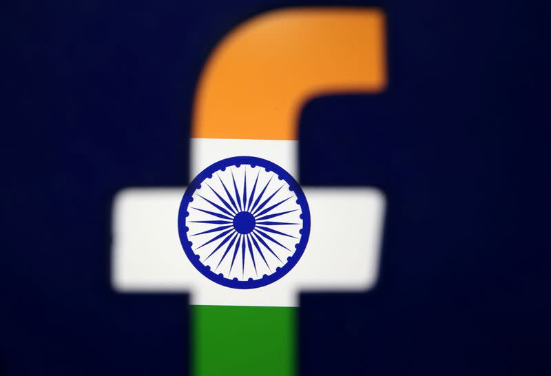 FILE PHOTO: India's flag is seen through a 3D printed Facebook logo in this illustration picture