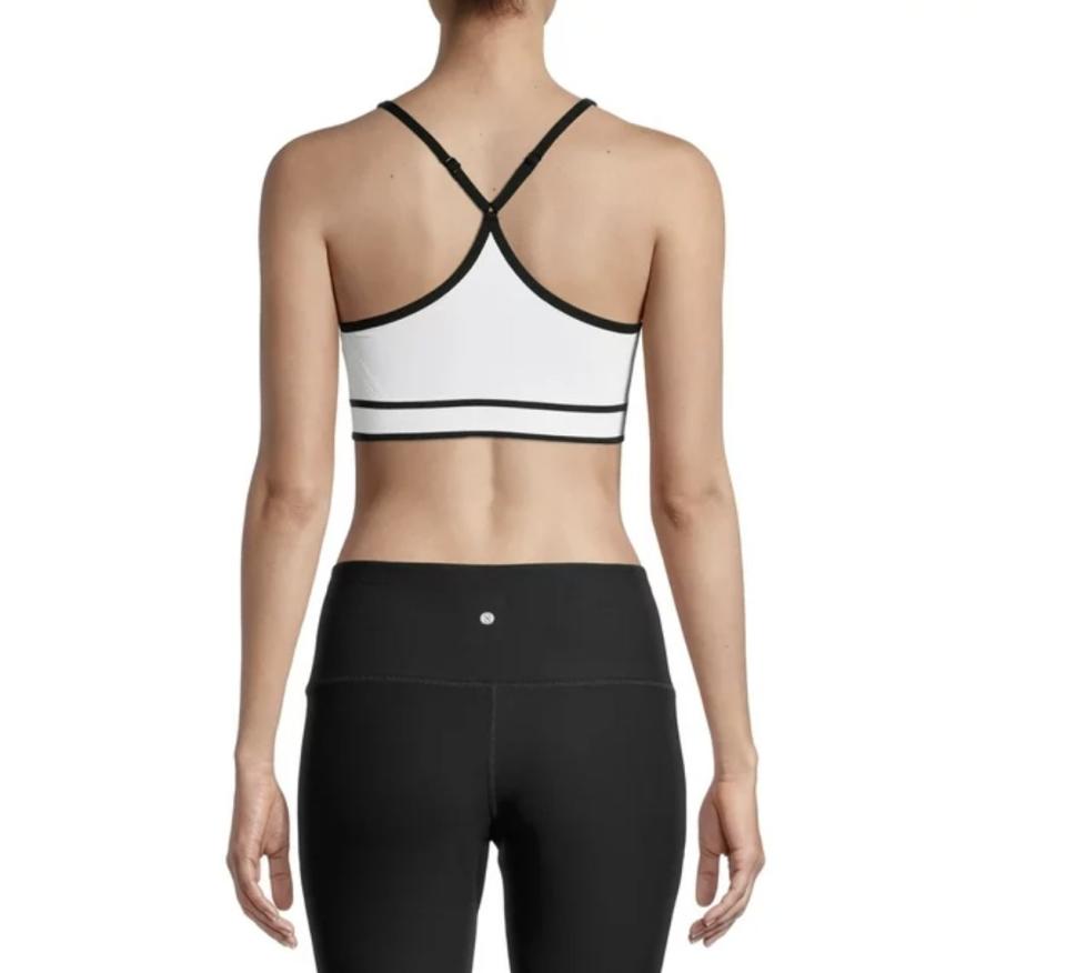 A white and black sports bra from the back