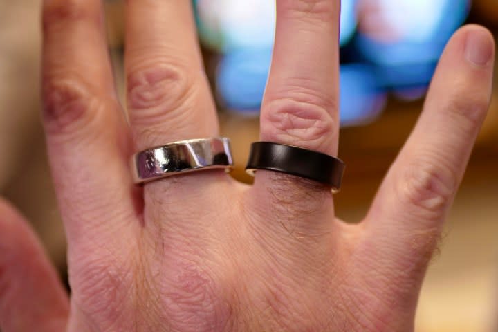 A person wearing the Samsung Galaxy Ring and the Oura Ring.