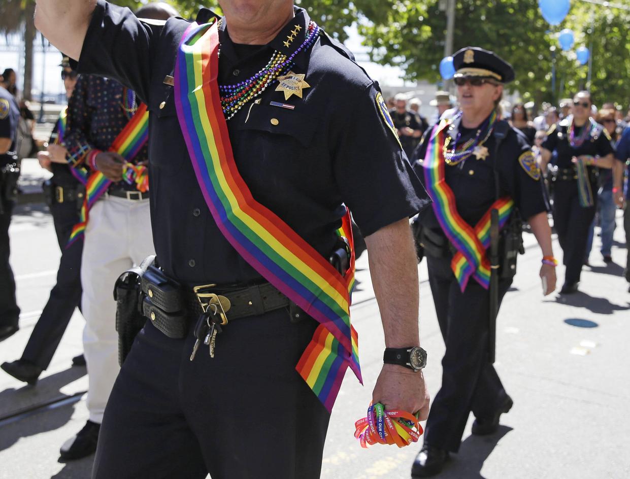 San Francisco police take part in the 44th annual Gay Pride parade Sunday, June 29, 2014, in San Francisco. 