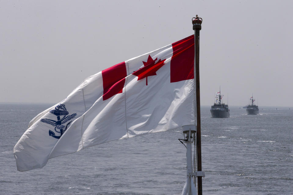 <p>The Royal Canadian Navy Ensign flies on the HMCS Kingston and HMCS Moncton sail behind during the parade of ships entering the New York Harbor, Wednesday, May 25, 2016. The annual Fleet Week is bringing activities, including a parade of ships sailing up the Hudson River and docking around the city. The events continue through Memorial Day. (AP Photo/Mary Altaffer) </p>