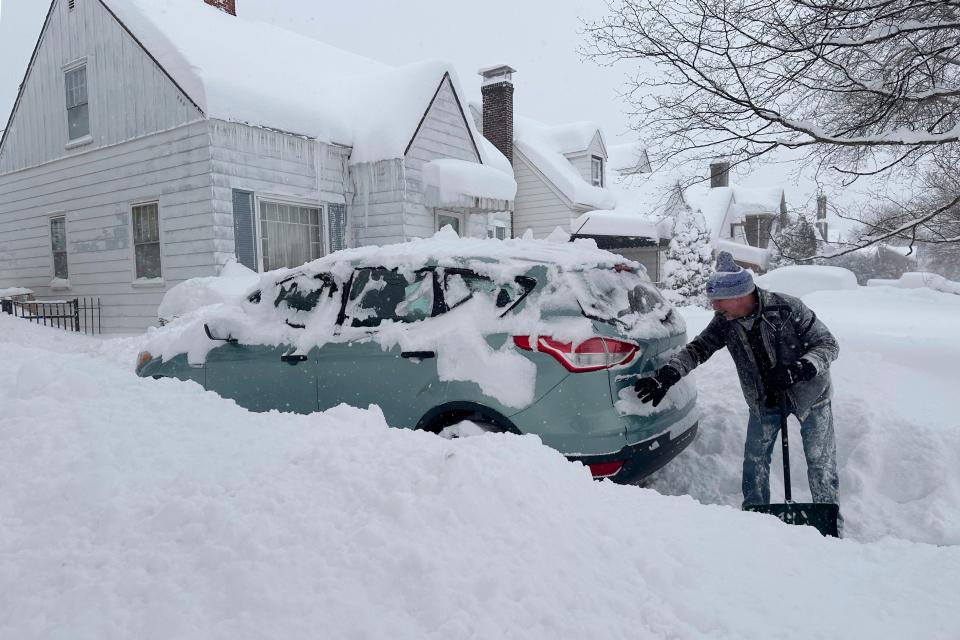 Patrick Sahr shovels snow in Buffalo, N.Y (AP)