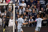 Real Salt Lake goalkeeper David Ochoa (1) blocks a shot during the second half of an MLS soccer match against Sporting Kansas City Sunday, Nov. 28, 2021, in Kansas City, Kan. Real Salt Lake won 2-1.(AP Photo/Charlie Riedel)