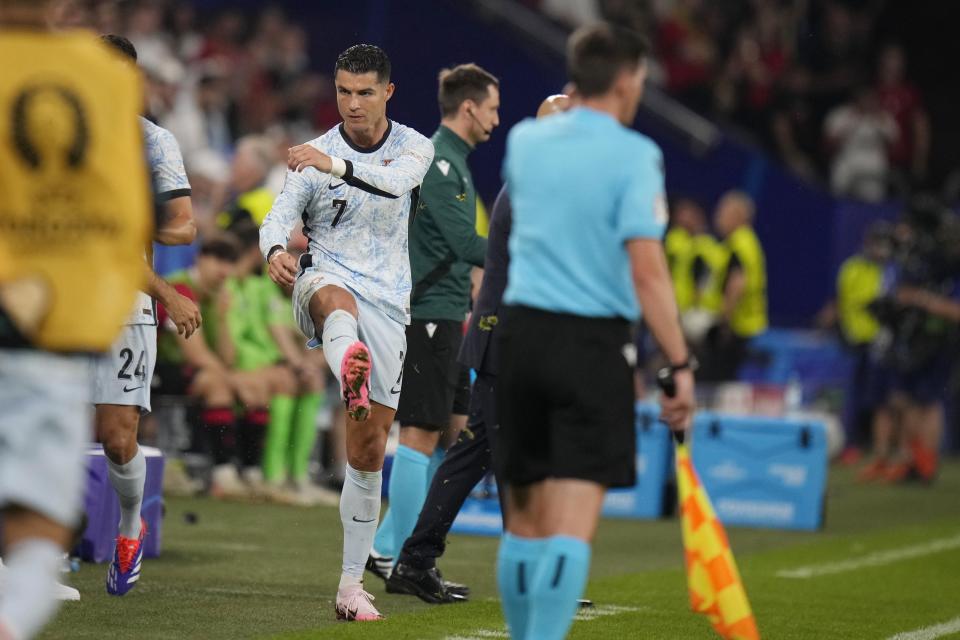 Portugal's Cristiano Ronaldo reacts after leaving the pitch during a Group F match between Georgia and Portugal at the Euro 2024 soccer tournament in Gelsenkirchen, Germany, Wednesday, June 26, 2024. (AP Photo/Alessandra Tarantino)