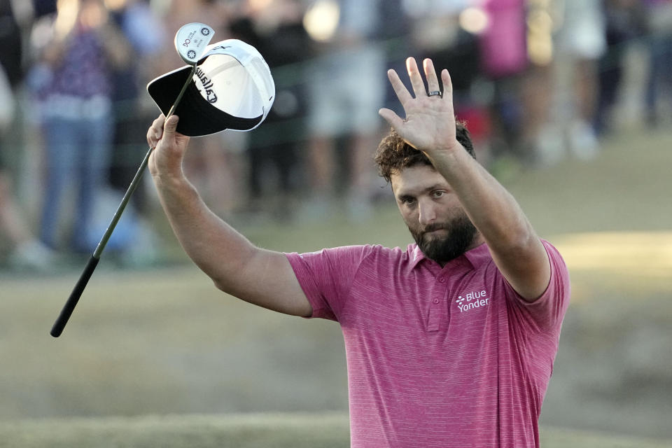 Jon Rahm waves to the gallery after winning the American Express golf tournament on the Pete Dye Stadium Course at PGA West Sunday, Jan. 22, 2023, in La Quinta, Calif. (AP Photo/Mark J. Terrill)