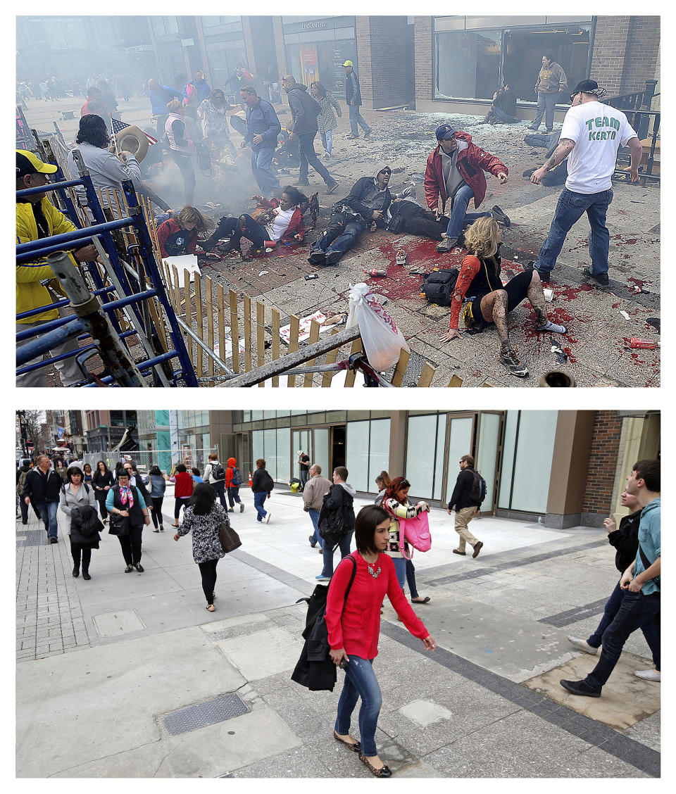 This combination of April 15, 2013 and April 10, 2014 photos show views of Boylston Street with people on the ground after the first of two bombs exploded near the finish line of the 2013 Boston Marathon, then pedestrians walking along the same sidewalk almost a year later in Boston. (AP Photo/MetroWest Daily News, Ken McGagh; and Elise Amendola) MANDATORY CREDIT.