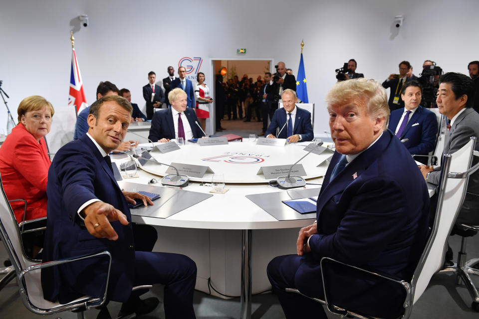 BIARRITZ, FRANCE - AUGUST 25: France's President Emmanuel Macron and US President Donald Trump pose for the media as they meet for the first working session of the G7 Summit on August 25, 2019 in Biarritz, France. The French southwestern seaside resort of Biarritz is hosting the 45th G7 summit from August 24 to 26. High on the agenda will be the climate emergency, the US-China trade war, Britain's departure from the EU, and emergency talks on the Amazon wildfire crisis. (Photo by Jeff J Mitchell - Pool /Getty Images)