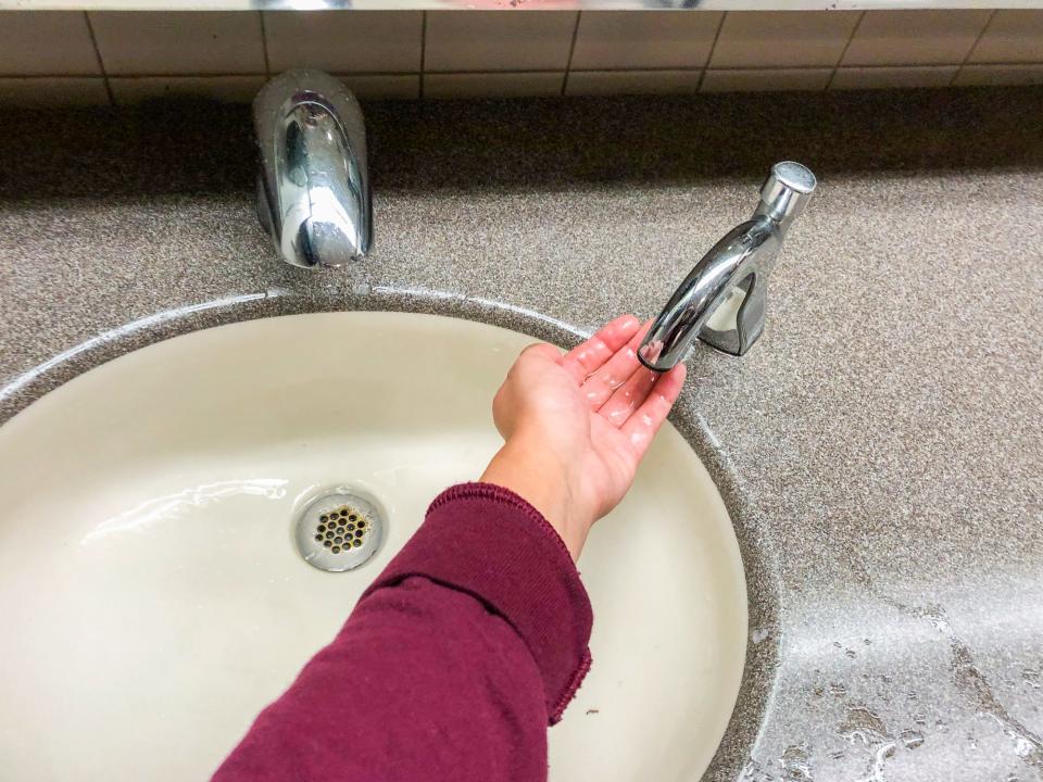 wash hands flying during coronavirus austin bergstrom airport womens bathroom