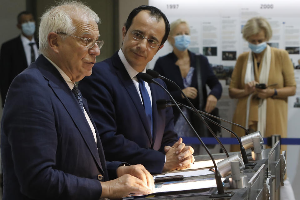 The European Union's Foreign Policy Chief Josep Borrell, left, and Cyprus' Foreign Minister Nikos Christodoulides speak during a joint news conference at the Cypriot foreign ministry on Thursday, June 25, 2020. Borrell is in Cyprus to discuss developments in the EU's southeastern-most corner that borders a tumultuous region. (AP Photo/Petros Karadjias)