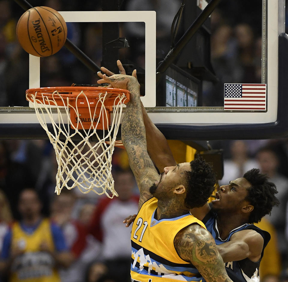 Wilson Chandler blocks a potential game-tying shot by Andrew Wiggins with less than 10 seconds to play on Wednesday. (AAron Ontiveroz/The Denver Post via Getty Images)