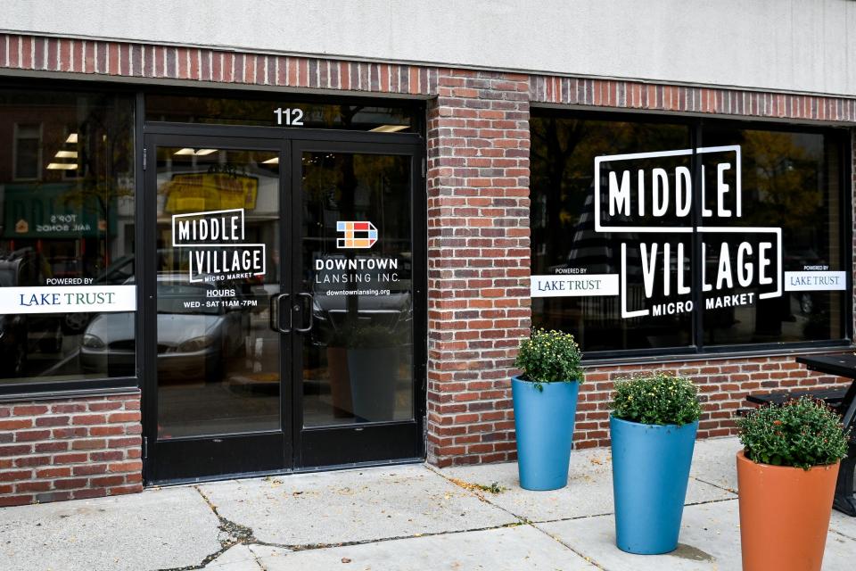 The entrance to the Middle Village Micro Market is located at 112 South Washington Square (near the Michigan Avenue traffic circle) in downtown Lansing.