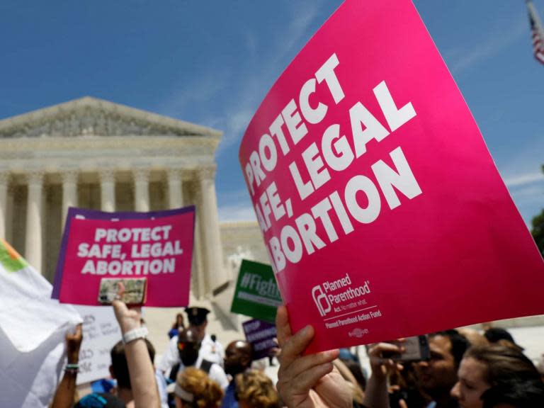 The Trump administration cannot block pregnant, undocumented teenagers held in government custody from getting abortions, a federal appeals court has ruled.The court concluded that it was “rejecting the government’s position that its denial of abortion access can be squared with Supreme Court precedent”. The American Civil Liberties Union (ACLU) initially brought the case on behalf of a 17-year-old girl from Central America held in a government-funded shelter in Texas.In October 2017, then-Judge Brett Kavanaugh refused to let the girl have an abortion, even though she was 15 weeks pregnant and had already obtained judicial bypass pursuant to state law. The US Court of Appeals for the District of Columbia Circuit reversed Mr Kavanaugh’s decision, allowing the girl to terminate her pregnancy.The government's Office of Refugee Resettlement in 2017 had adopted a policy of refusing to “facilitate” abortions for teens in its custody who had crossed the border illegally.In its 81-page ruling on Friday, the court noted that under the policy, the former director of the office, E Scott Lloyd, had to review individual abortion requests and had never approved one, including when the pregnancy resulted from rape.Even when one teen obtained private funding and transportation for the abortion, the director refused to let her leave the shelter to undergo the procedure.“That is not a refusal to fund an abortion; it is a refusal to allow it,” the court said in an unsigned opinion joined by Judges Sri Srinivasan and Robert Wilkins.Brigitte Amiri, the ACLU attorney who argued the case, said dozens of young women have benefited because of the injunction the court upheld Friday that protects access.Ms Amiri's colleagues receive one to three calls each week, she said, from teens in shelters seeking information about abortion services. “It's a tremendous relief that the government will continue to be prohibited from blocking access to critical care for unaccompanied minors,” she said.A Justice Department spokesperson was not immediately available for comment.In 2018, almost 50,000 unaccompanied minors were referred to the refugee resettlement office, and each year the office has several hundred pregnant minors in its custody.The case attracted significant attention with its explosive mix of abortion and immigration policies, and because of the previous involvement of Supreme Court Justice Brett Kavanaugh while he was on the DC Circuit.Last March, a federal judge in Washington, issued a nationwide order that prevented the government from interfering with access to abortion services.Justice Department lawyers had asked the appeals court to reverse the order, saying the government should not have to “facilitate the termination of life through abortion". The court rejected the government's argument that the teenagers could always voluntarily return to their home countries to terminate their pregnancies in part because the teenagers would need sign off from the US government.“Voluntary departure, then, is not a freely available escape hatch from a government veto on abortion. It is instead a second government veto,” the court ruled on Friday. In addition, the court noted that the teenagers were unlikely to be able to obtain abortions in their home countries because most minors in custody come from Honduras, Guatemala or El Salvador. “Abortion is criminalised in all three countries,” the court said.The government lawyers also asked the appeals court for leeway to consider the circumstances of each individual teen in custody instead of allowing the case to move forward as an official class or group of litigants.In his dissent, Judge Laurence H Silberman said the class certified by the court “is much too broad; it should not include pregnant minors who do not wish an abortion”.Those challenging the policy “contend that all pregnant minors – whether or not they want an abortion – are really aligned with the class representatives because the relevant constitutional right in their view is the right to choose whether or not to have an abortion,” Mr Silberman wrote.“I think that confuses a political slogan with a constitutional right.” The Trump administration's policy departed from that of the Obama administration, which did not block migrants in US custody from having abortions at their own expense.Justice Kavanaugh was on an earlier panel of appeals court judges reviewing the case when it first reached the DC Circuit. The case was repeatedly cited during his nomination battle by abortion rights advocates as evidence that Mr Kavanaugh would allow more restrictions on abortion than the justice he replaced, Anthony Kennedy.When the case initially was on appeal before the full court in October 2017, Mr Kavanaugh's colleagues reversed his order that would have delayed a teen's access to abortion services. Judges Srinivasan and Wilkins voted with the majority to allow immediate access. Mr Kavanaugh dissented.The Washington Post