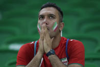 Iran's soccer team fan looks on at the end of the World Cup group B soccer match between Iran and the United States at the Al Thumama Stadium in Doha, Qatar, Wednesday, Nov. 30, 2022. (AP Photo/Ebrahim Noroozi)