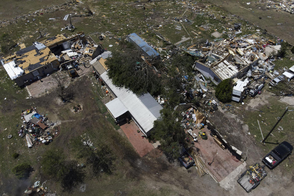 Destroyed homes are seen after a deadly tornado rolled through the previous night, Sunday, May 26, 2024, in Valley View, Texas. Powerful storms left a wide trail of destruction Sunday across Texas, Oklahoma and Arkansas after obliterating homes and destroying a truck stop where drivers took shelter during the latest deadly weather to strike the central U.S. (AP Photo/Julio Cortez)