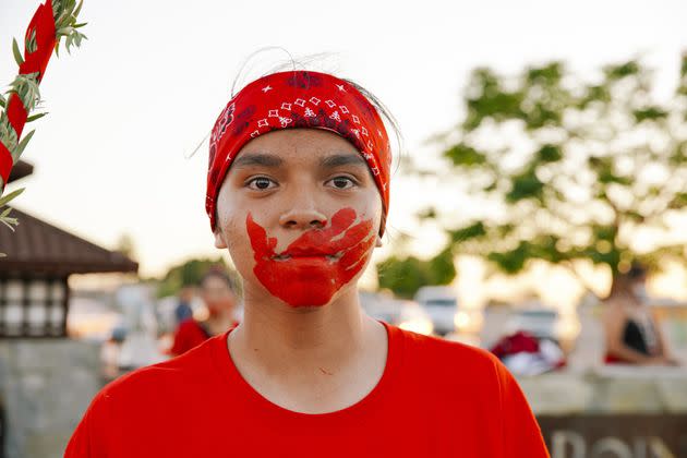 An Arizona community activist appears with the imprint of a bloody hand across her mouth, an attempt to bring attention to the soaring numbers of Indigenous women who are murdered and missing in the U.S. At least some of these women are believed to have been pulled into human trafficking operations.