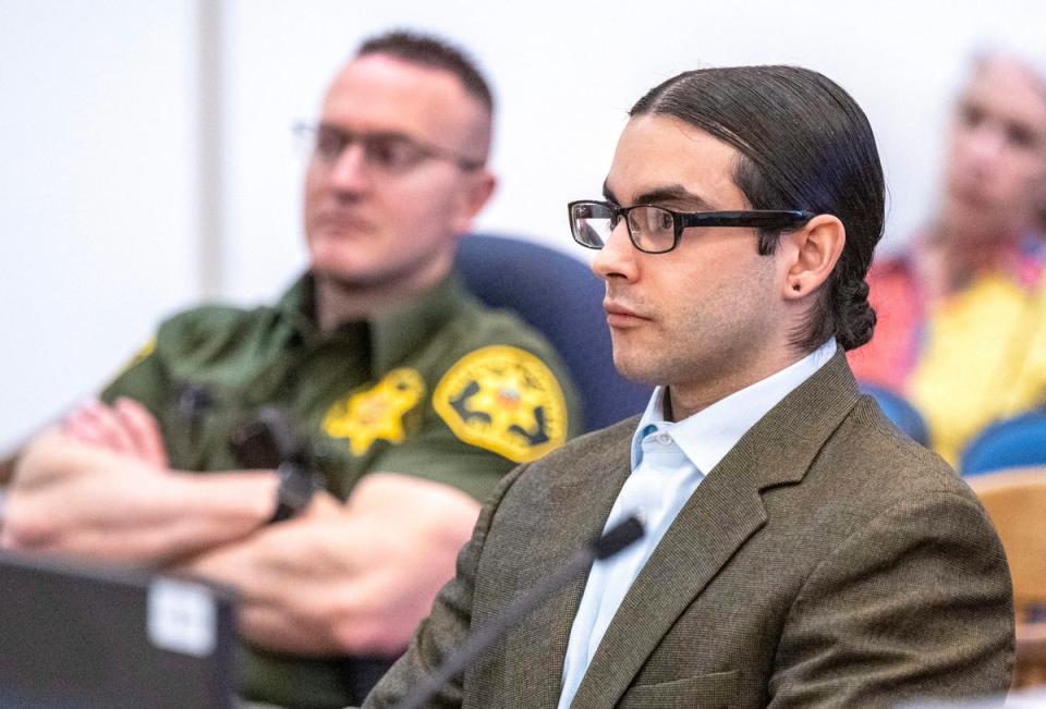 Marcus Eriz, pictured at his Friday sentencing, will spend at least 40 years in prison after killing six-year-old Aiden Leos (AP)