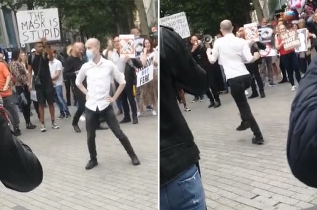 Funny moment man challenges anti-mask protesters to dance off