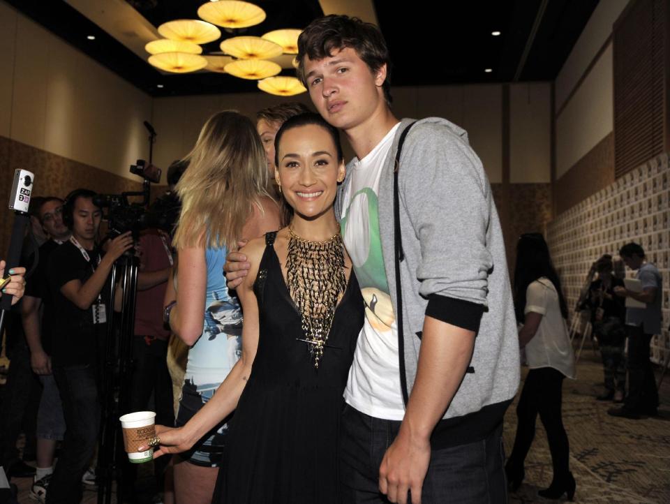 Maggie Q, left, and Ansel Elgort attend the "Divergent" press line on Day 2 of Comic-Con International on Thursday, July 18, 2013 in San Diego, Calif. (Photo by Chris Pizzello/Invision/AP)