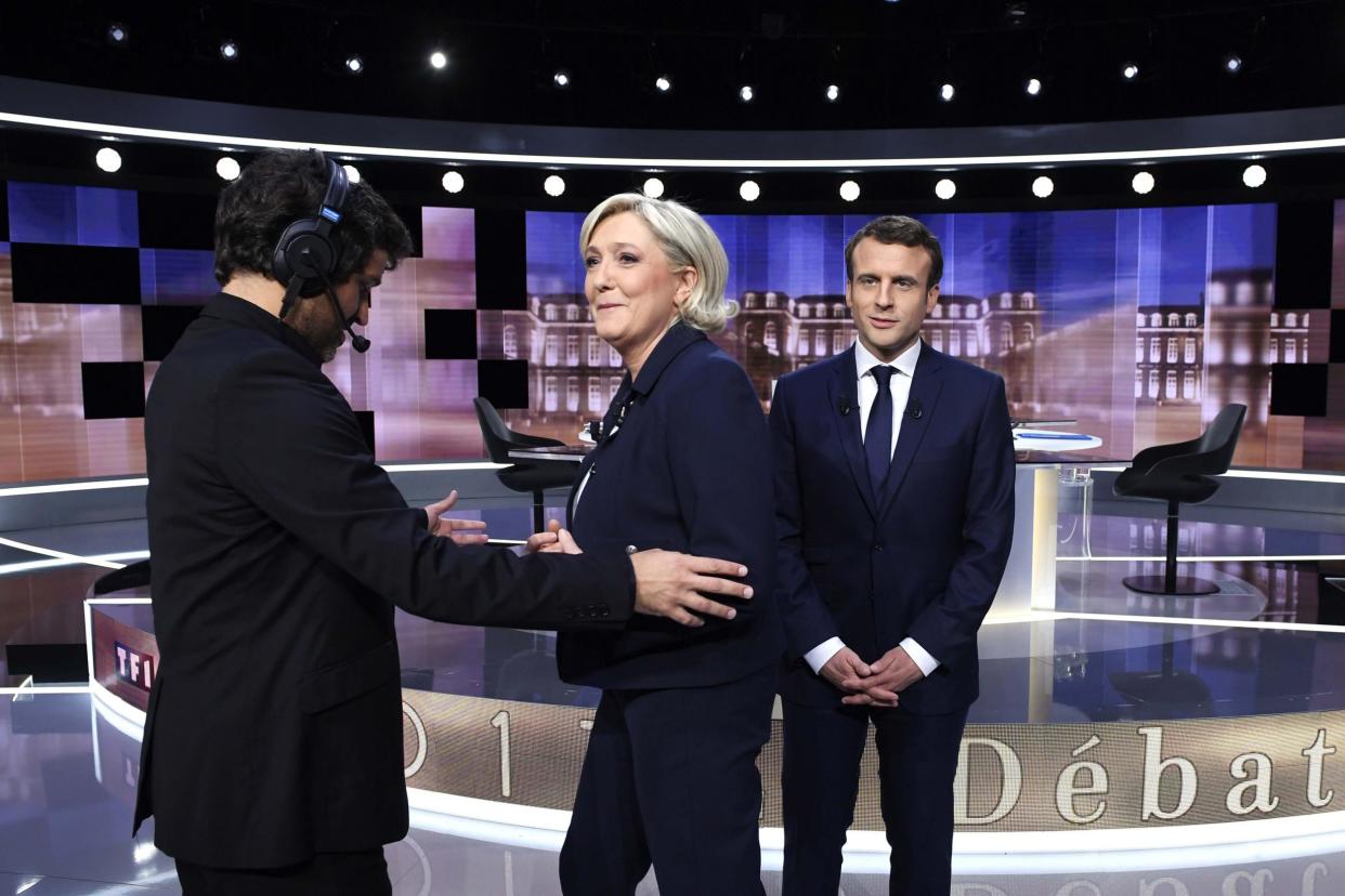 Emmanuel Macron and Marine Le Pen: Reuters