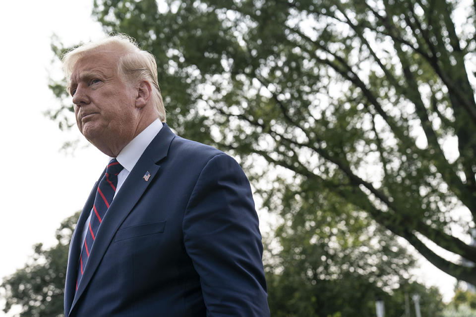 President Donald Trump departs after speaking with reporters as he walks to Marine One on the South Lawn of the White House.