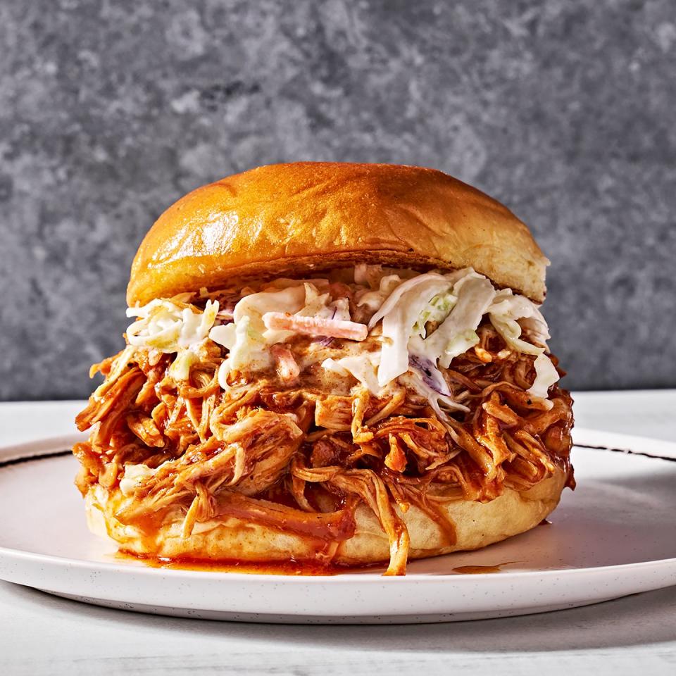 brown sugar bbq chicken in a sandwich with slaw