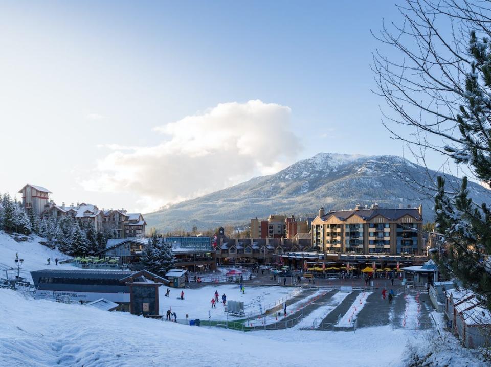 View of Whistler Village and ski runs at dusk.