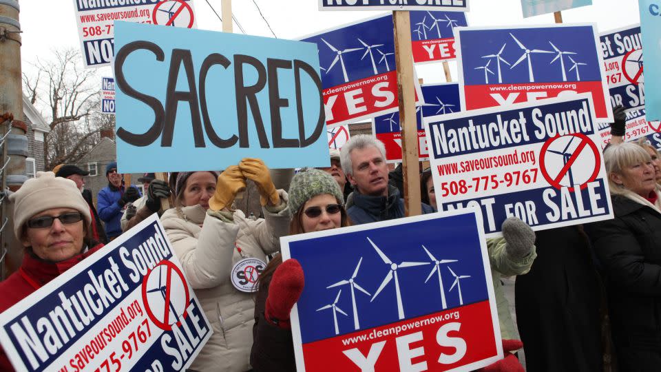 Supporters and opponents of the Cape Wind project protested outside the US Coastguard Station in Woodshole, Massachusetts in 2010.  - Julia Cumes/AP