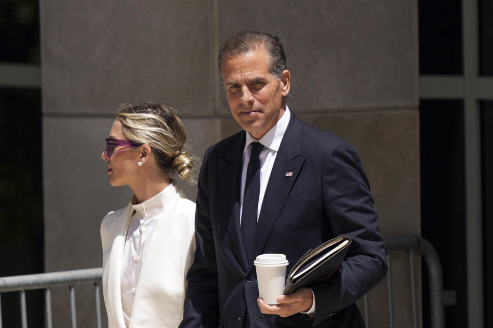 Hunter Biden, accompanied by his wife, Melissa Cohen Biden, depart from federal court, Friday, June 7, 2024, in Wilmington, Del. (AP Photo/Matt Rourke)