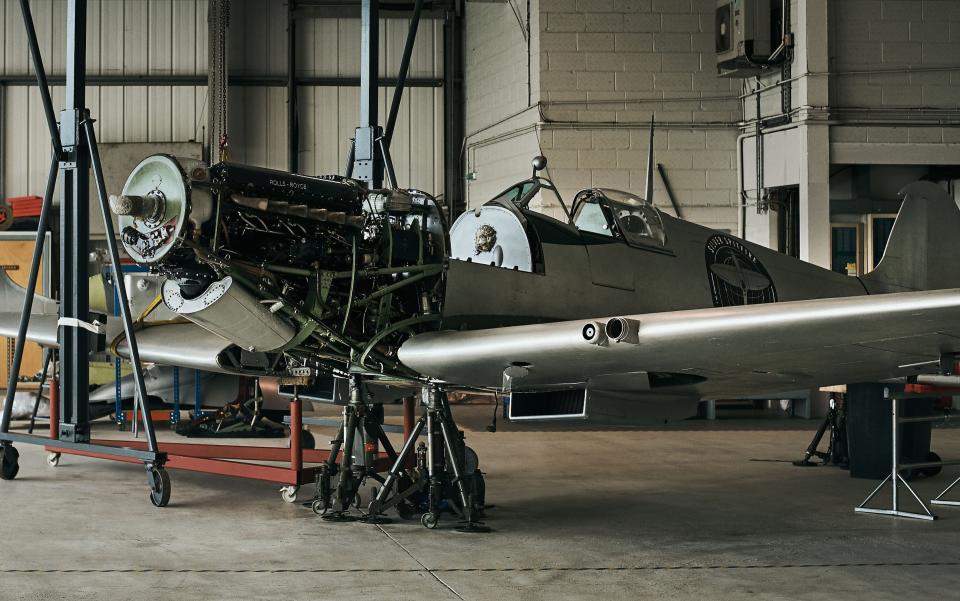 Martin Phillips’s Spitfire, wearing temporary silver paint so it can stand in – if needed – for the Silver Spitfire set to circumnavigate the globe this summer; here, it is having its wings reattached after being transported to Geneva for an event with the watch company IWC - 