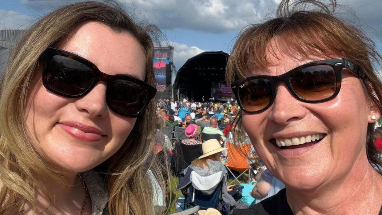 lorraine kelly and daughter rosie smiling at festival 