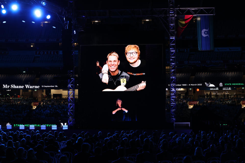 MELBOURNE, AUSTRALIA - MARCH 30: A photo of Shane Warne and Ed Sheeran is seen on the big screen during the state memorial service for former Australian cricketer Shane Warne at the Melbourne Cricket Ground on March 30, 2022 in Melbourne, Australia. Warne died suddenly aged 52 on Friday 4 March while on holiday in Thailand. (Photo by Robert Cianflone/Getty Images)