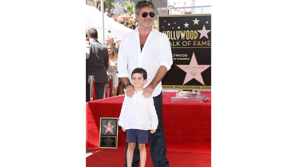 Simon Cowell and his son, Eric Cowell attend the ceremony honoring Simon Cowell with a Star on The Hollywood Walk of Fame held on August 22, 2018