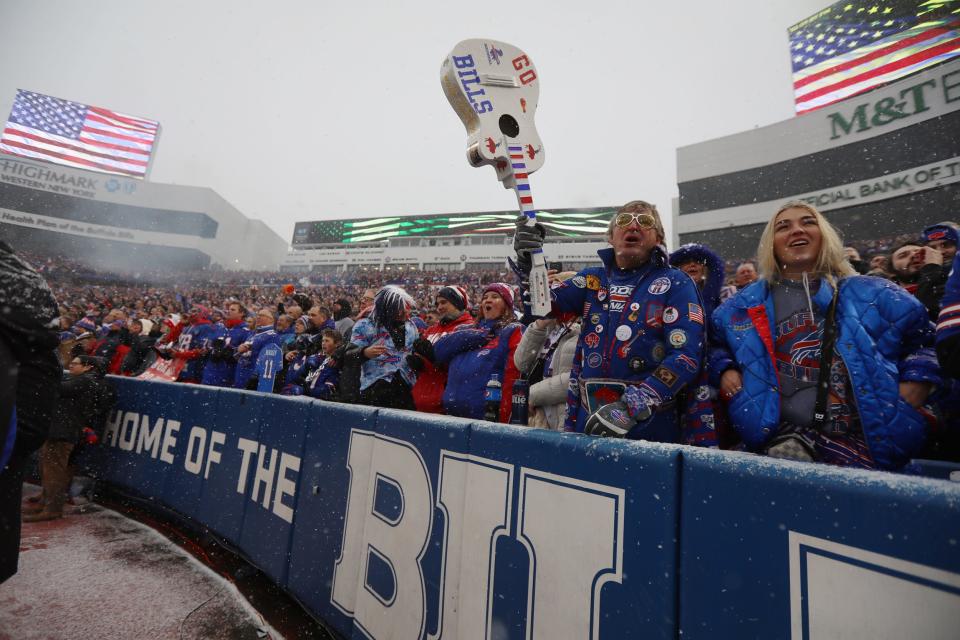 Fans cheer after the playing of the national anthem at Highmark Stadium in Orchard Park on Jan. 22.