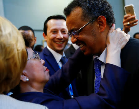 Outgoing Director-General Margaret Chan (L) congratulates Tedros Adhanom Ghebreyesus after his election as Director General of the World Health Organization (WHO) during the 70th World Health Assembly in Geneva, Switzerland, May 23, 2017. REUTERS/Denis Balibouse