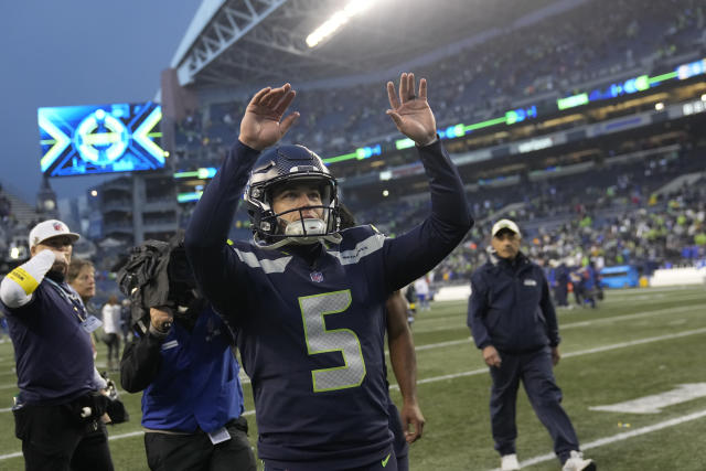 Seattle Seahawks place kicker Jason Myers (5) runs down the field during a  preseason NFL Football game in Arlington, Texas, Friday, Aug. 27, 2022. (AP  Photo/Michael Ainsworth Stock Photo - Alamy