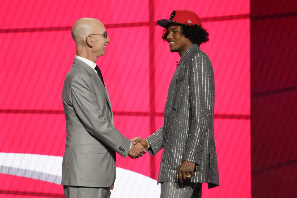 NBA Commissioner Adam Silver greets Jalen Green after he was selected by the Houston Rockets as the second pick during the first round of the NBA basketball draft, Thursday, July 29, 2021, in New York. (AP Photo/Corey Sipkin)