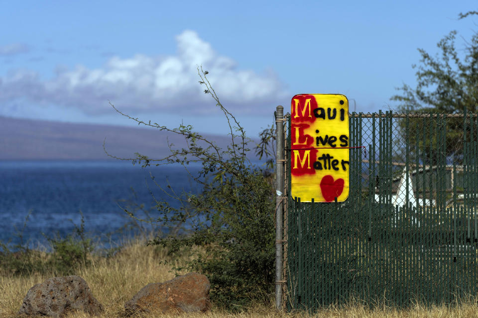 A "Maui Lives Matter" sign is posted along the Honoapi'ilani Highway near a residential area destroyed by a wildfire in Lahaina, Hawaii, Saturday, Aug. 19, 2023. (AP Photo/Jae C. Hong)