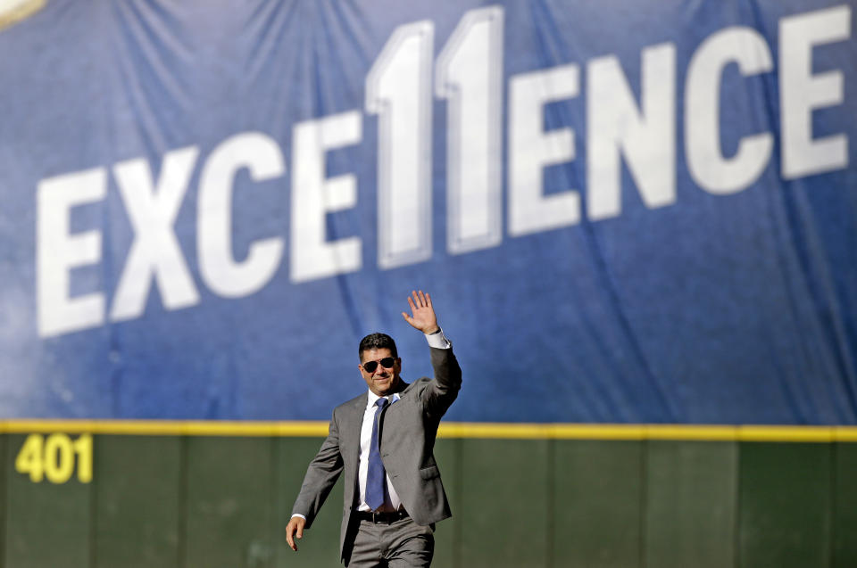 FILE - In this Aug. 12, 2017, file photo, former Seattle Mariners designated hitter Edgar Martinez waves as he walks to a ceremony retiring his No. 11 before a baseball game between the Mariners and the Los Angeles Angels in Seattle. Martinez was elected to baseball's Hall of Fame Tuesday, Jan. 22, 2019. (AP Photo/Elaine Thompson, File)