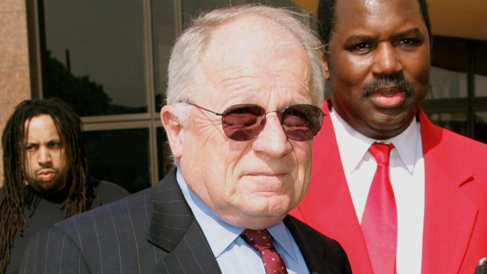 Attorney F. Lee Bailey (center) arrives to the April 2005 funeral services for lawyer Johnnie L. Cochran Jr. at the West Angeles Cathedral in Los Angeles. (Photo by Frederick M. Brown/Getty Images)