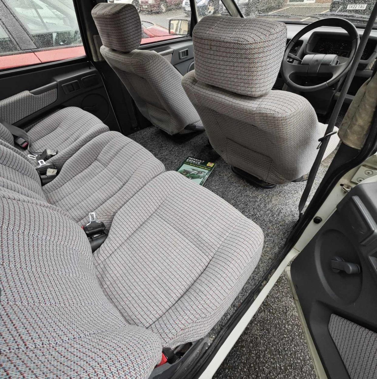 Grey, boxy interior of early Renault Espace